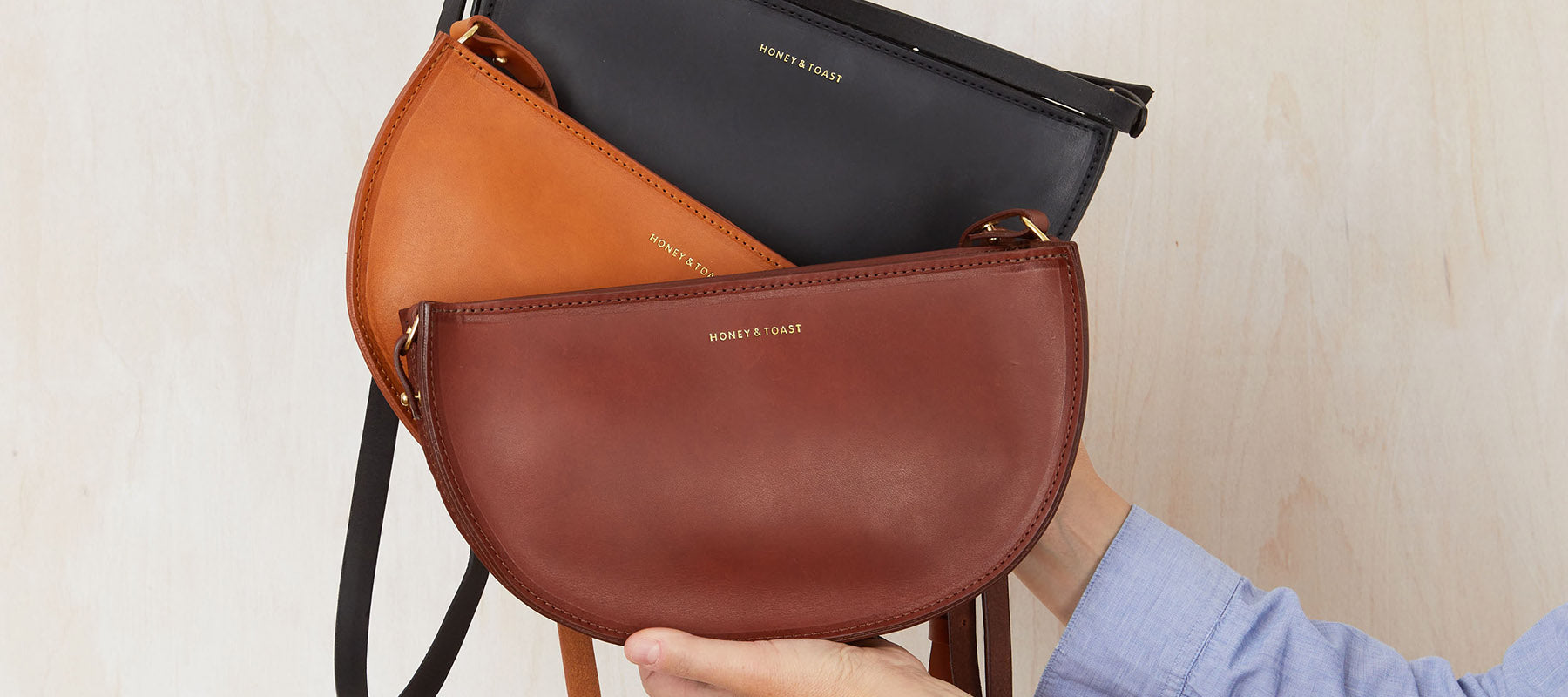 Honey and Toast tan leather bag half moon