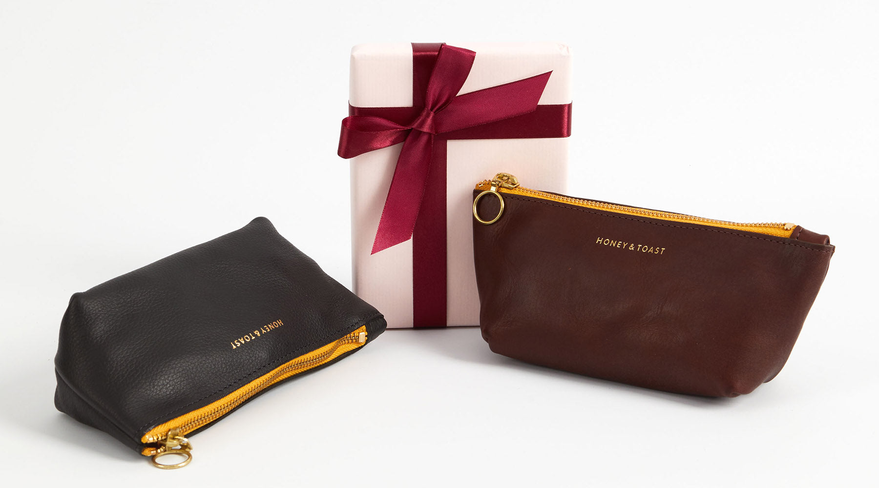 Honey and Toast black grainy leather zip top case