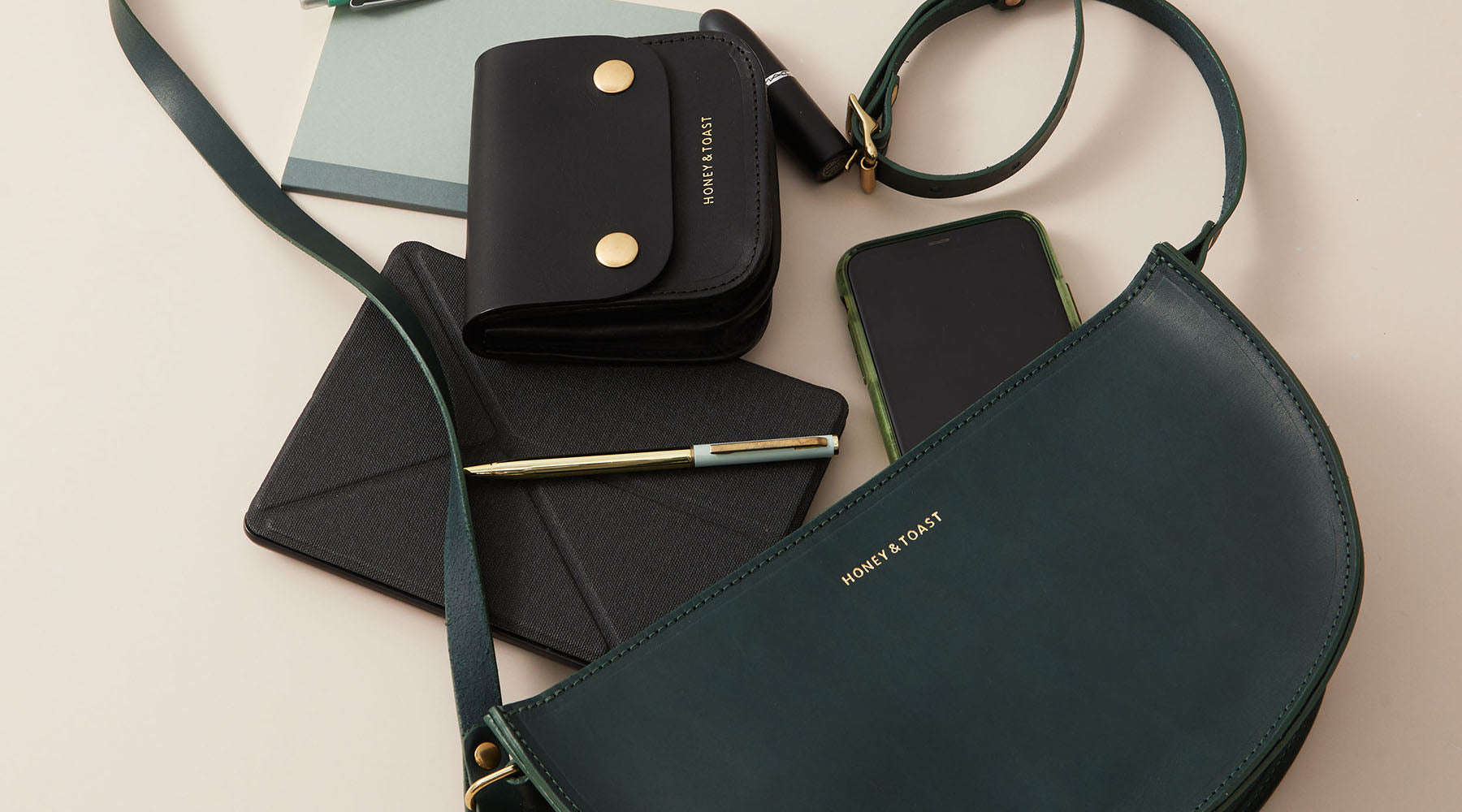 Honey and Toast black leather Katie bag and contents