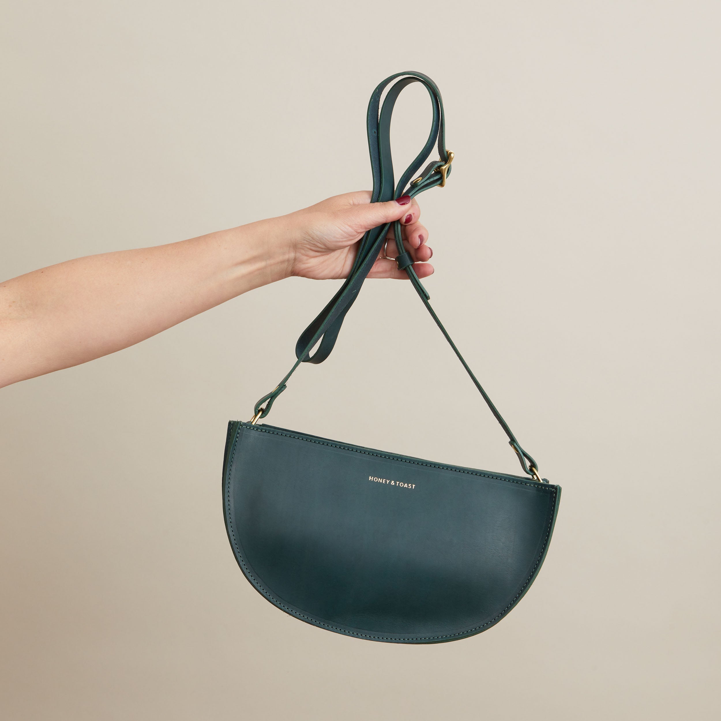 Honey and Toast women's leather handbag Large half moon bag pine