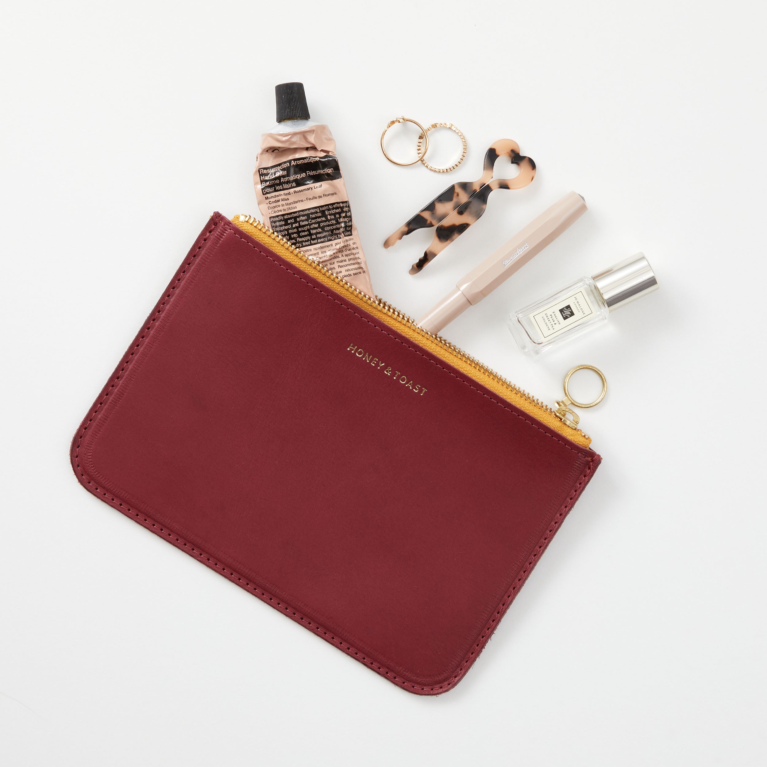 Honey and Toast women's leather purse Bailey zip top pouch raspberry pink
