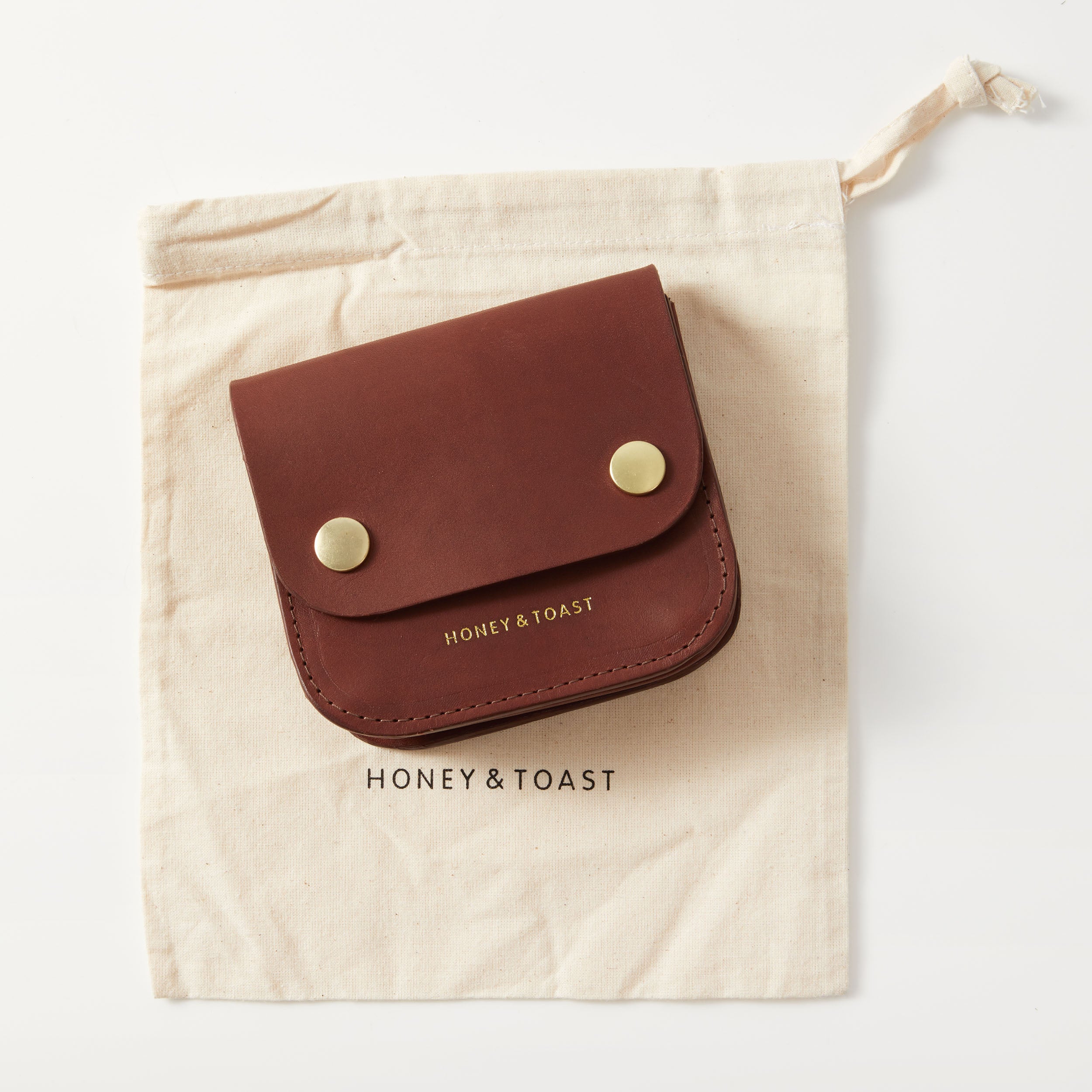https://www.honeyandtoast.co.uk Mini Flora purse conker
