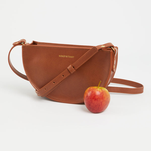 https://www.honeyandtoast.co.uk women's leather handbag Apple tan leather half moon bag tan