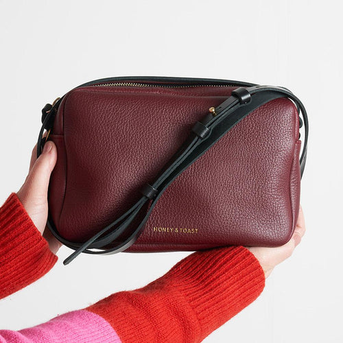 https://www.honeyandtoast.co.uk women's leather handbag Katie zip camera bag damson SAMPLE SALE