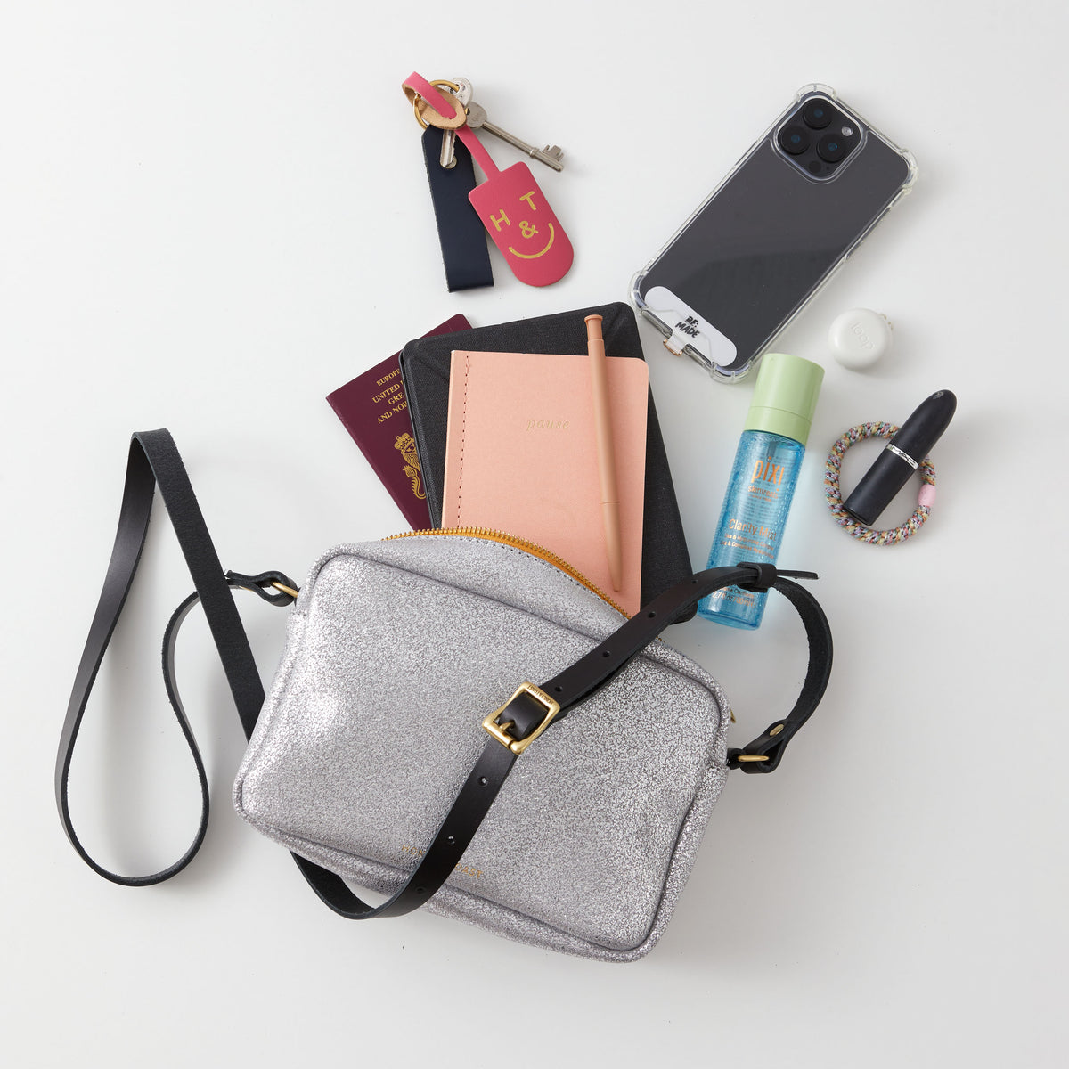 https://www.honeyandtoast.co.uk women's leather handbag Katie zip camera bag metallic silver