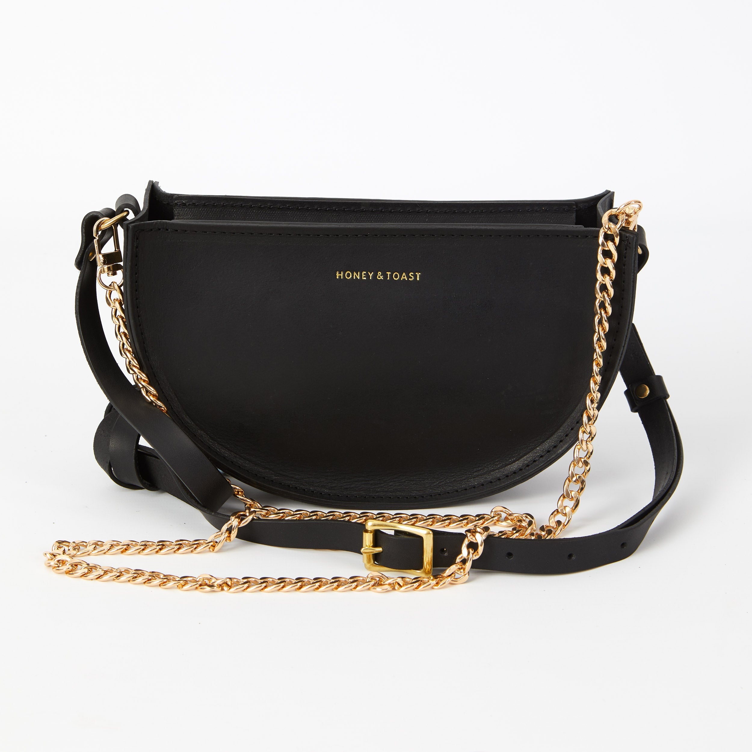 https://www.honeyandtoast.co.uk Half moon bag black
