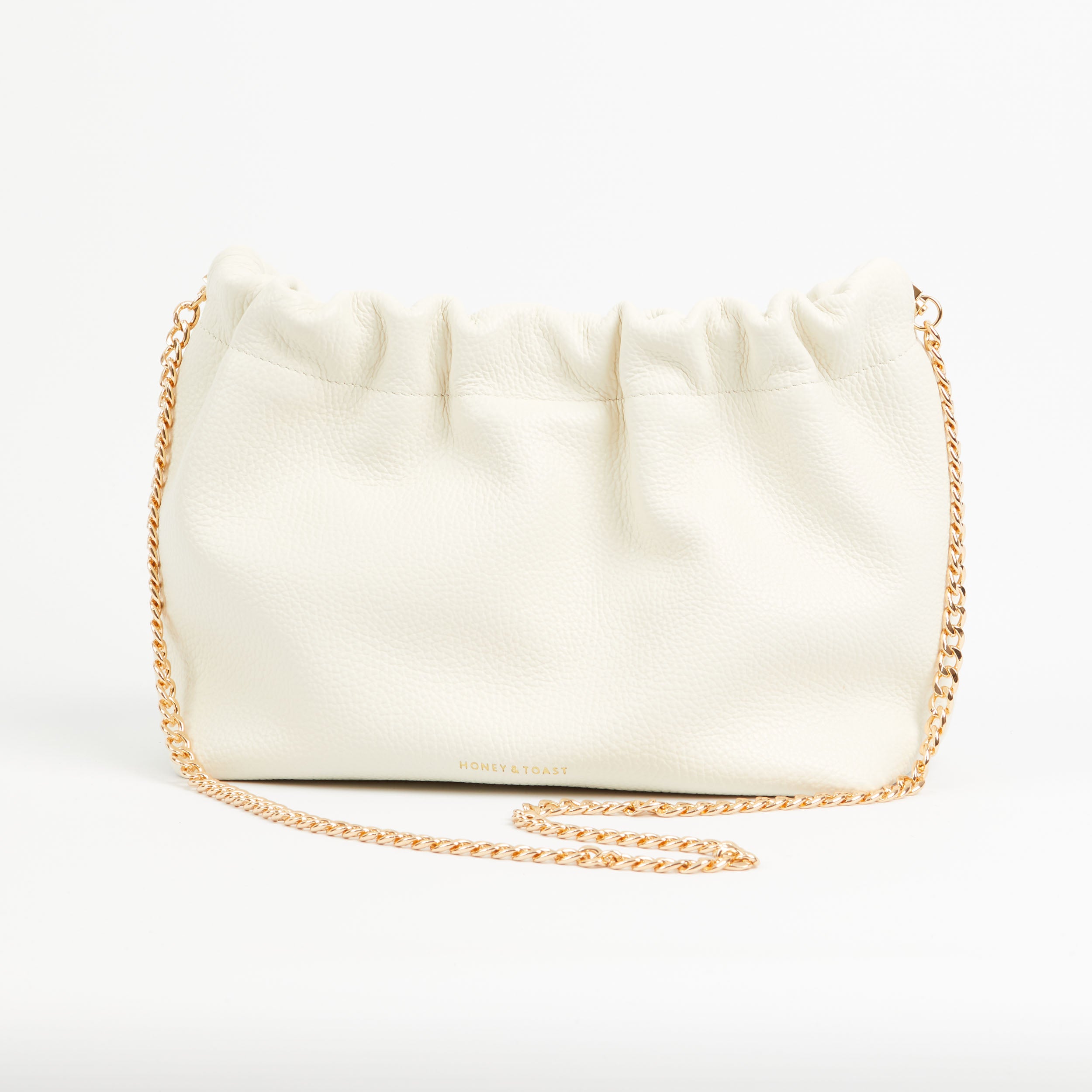 https://www.honeyandtoast.co.uk women's leather handbag Jamie cinch shoulder bag chalk white