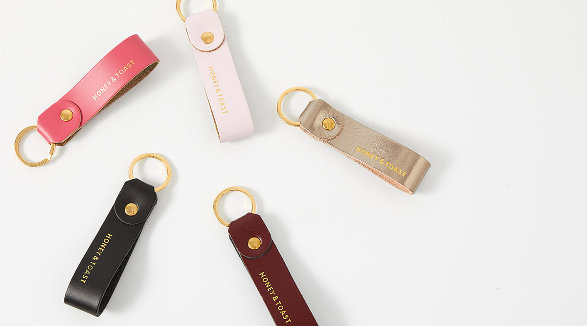 Honey and Toast leather keyring loops in pink, black, platinum, dark red