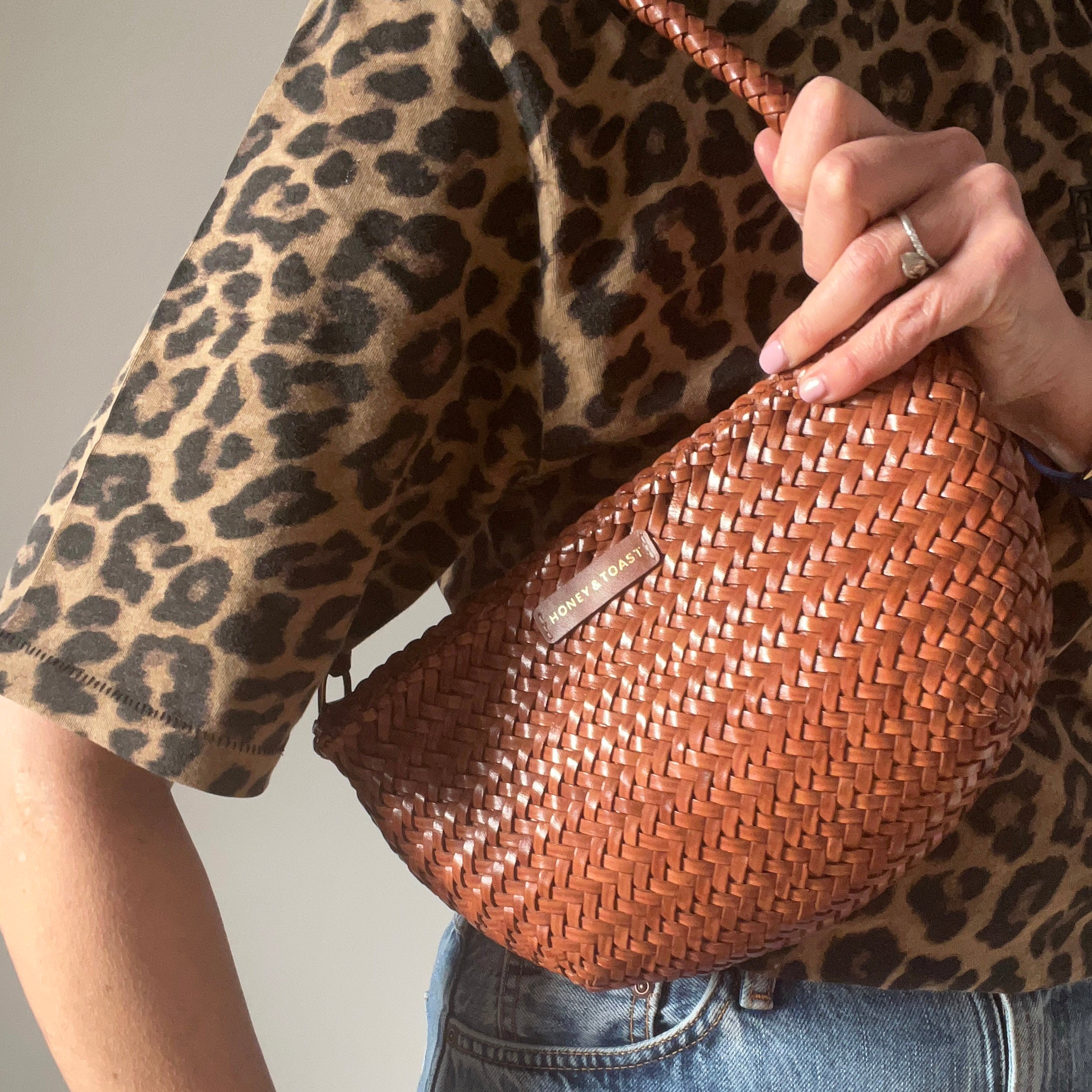 Honey and Toast women's leather handbag Half moon bag tan woven leather