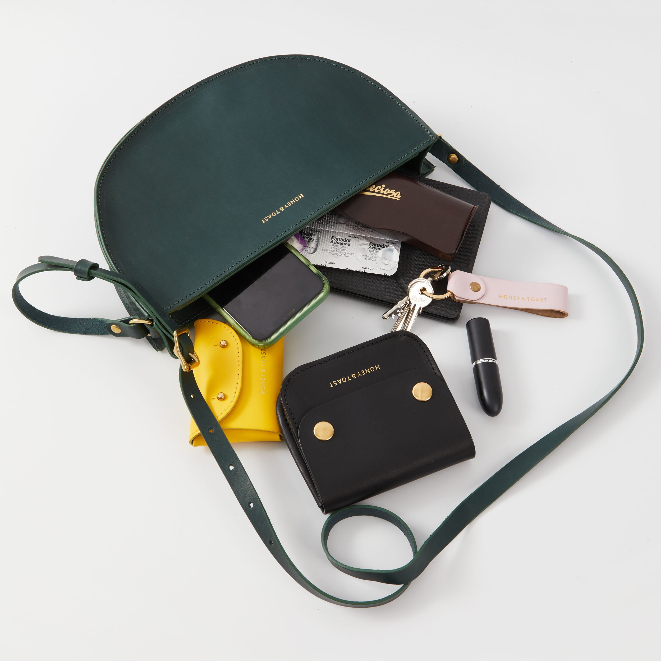 Honey and Toast women's leather handbag Large half moon bag pine