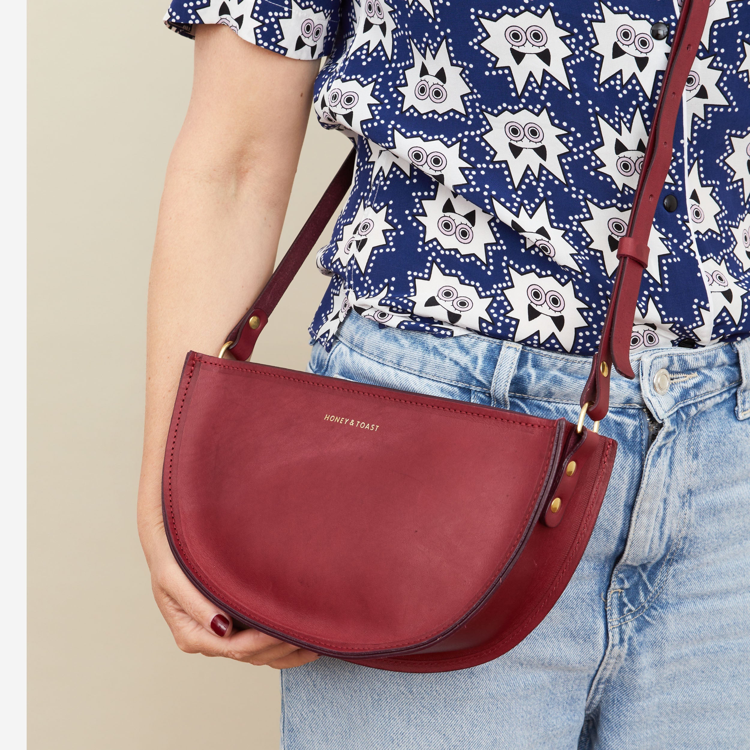 Honey and Toast women's leather handbag Large half moon bag raspberry