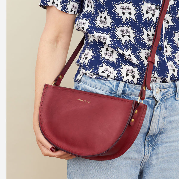 Honey and Toast women's leather handbag Large half moon bag raspberry