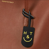 https://www.honeyandtoast.co.uk Leather tag Leather H&T tag black