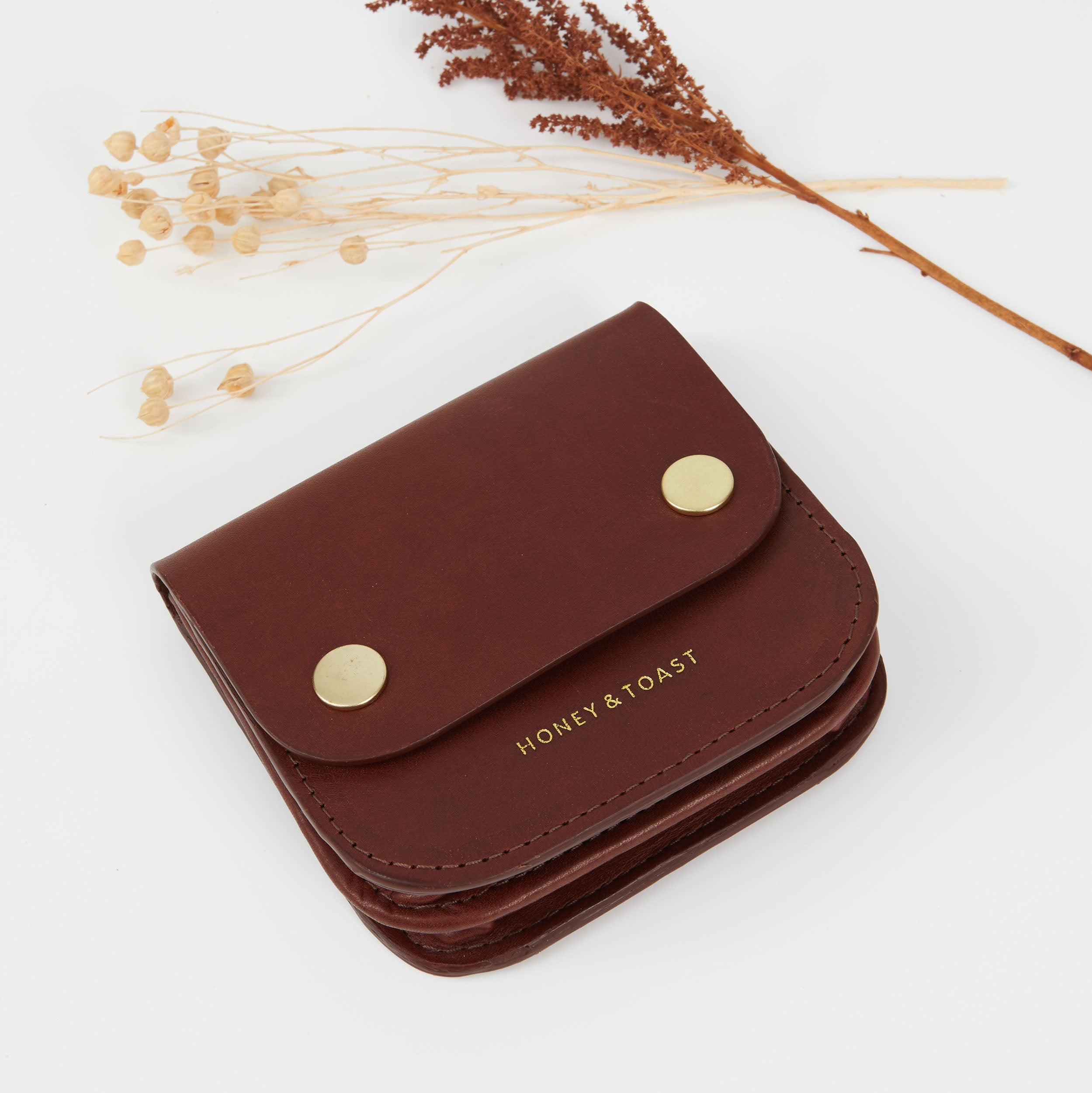 https://www.honeyandtoast.co.uk Mini Flora purse conker
