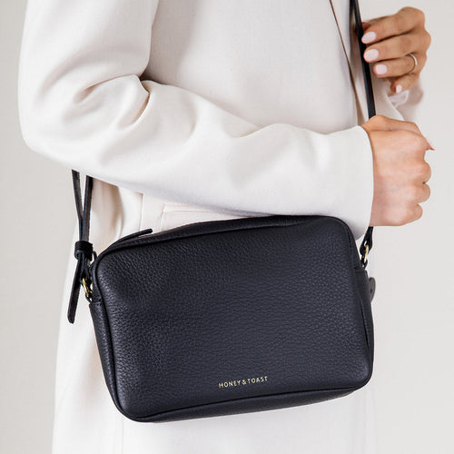 https://www.honeyandtoast.co.uk women's leather handbag Katie zip camera bag black
