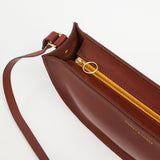 https://www.honeyandtoast.co.uk women's leather handbag Large half moon bag conker