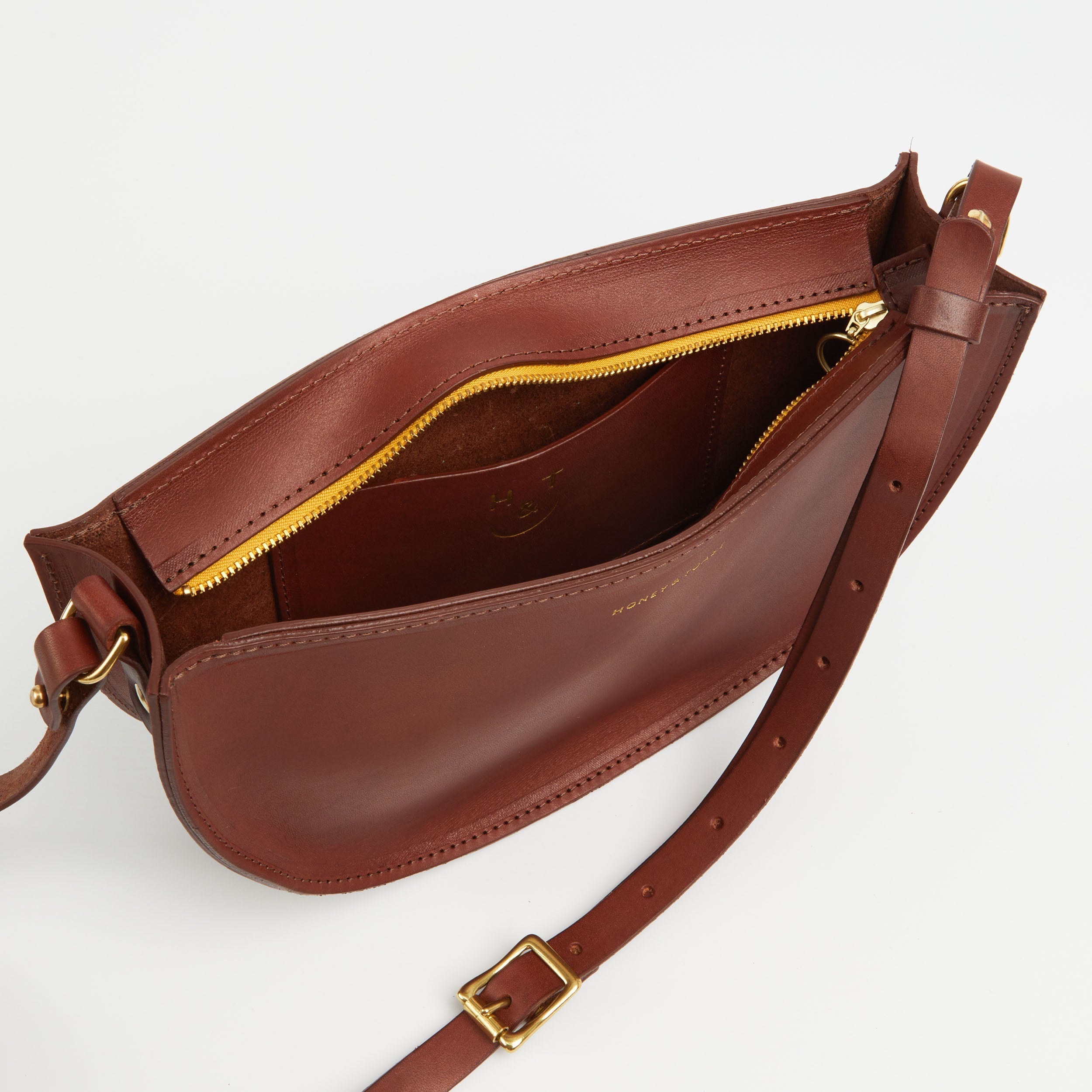 https://www.honeyandtoast.co.uk women's leather handbag Large half moon bag conker