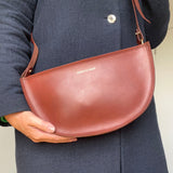 https://www.honeyandtoast.co.uk women's leather handbag Large half moon bag conker SAMPLE SALE