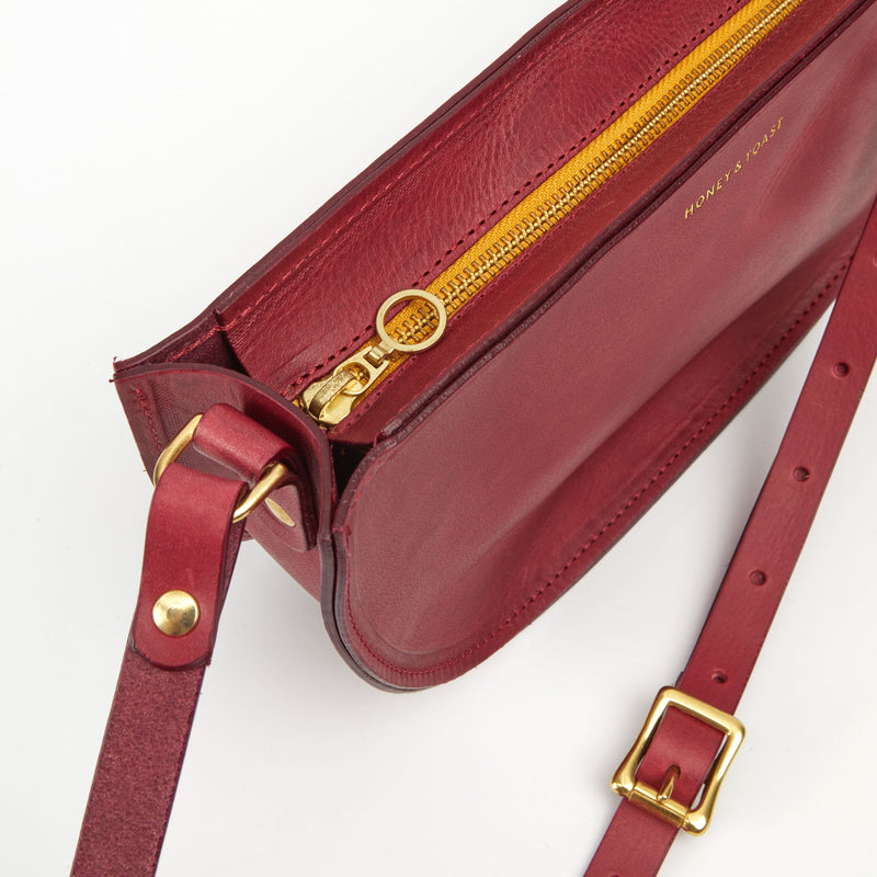 https://www.honeyandtoast.co.uk women's leather handbag Large half moon bag raspberry