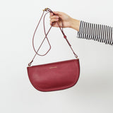 https://www.honeyandtoast.co.uk women's leather handbag Large half moon bag raspberry