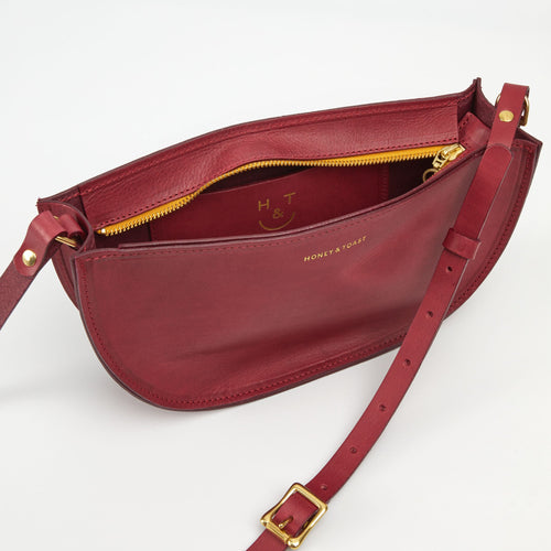 https://www.honeyandtoast.co.uk women's leather handbag Large half moon bag raspberry SAMPLE SALE