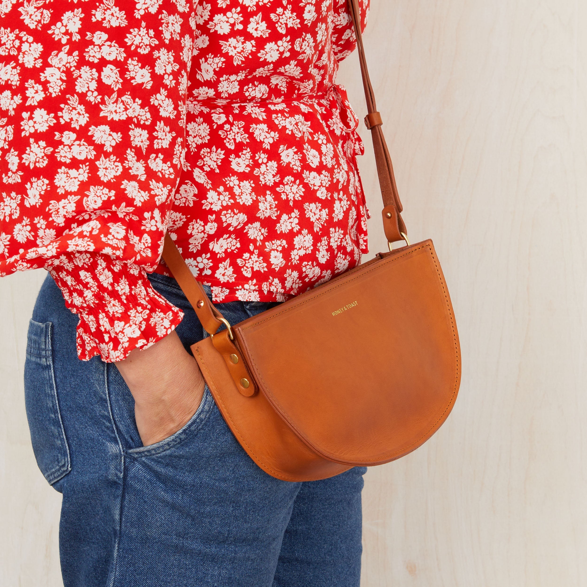 https://www.honeyandtoast.co.uk women's leather handbag Large half moon bag tan