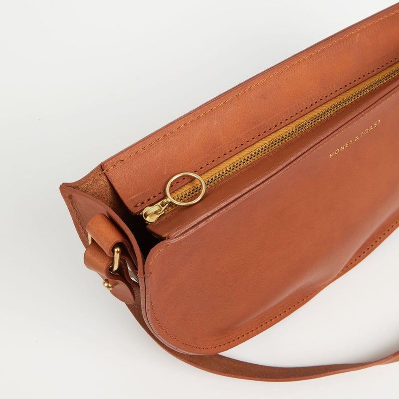 https://www.honeyandtoast.co.uk women's leather handbag Large half moon bag tan