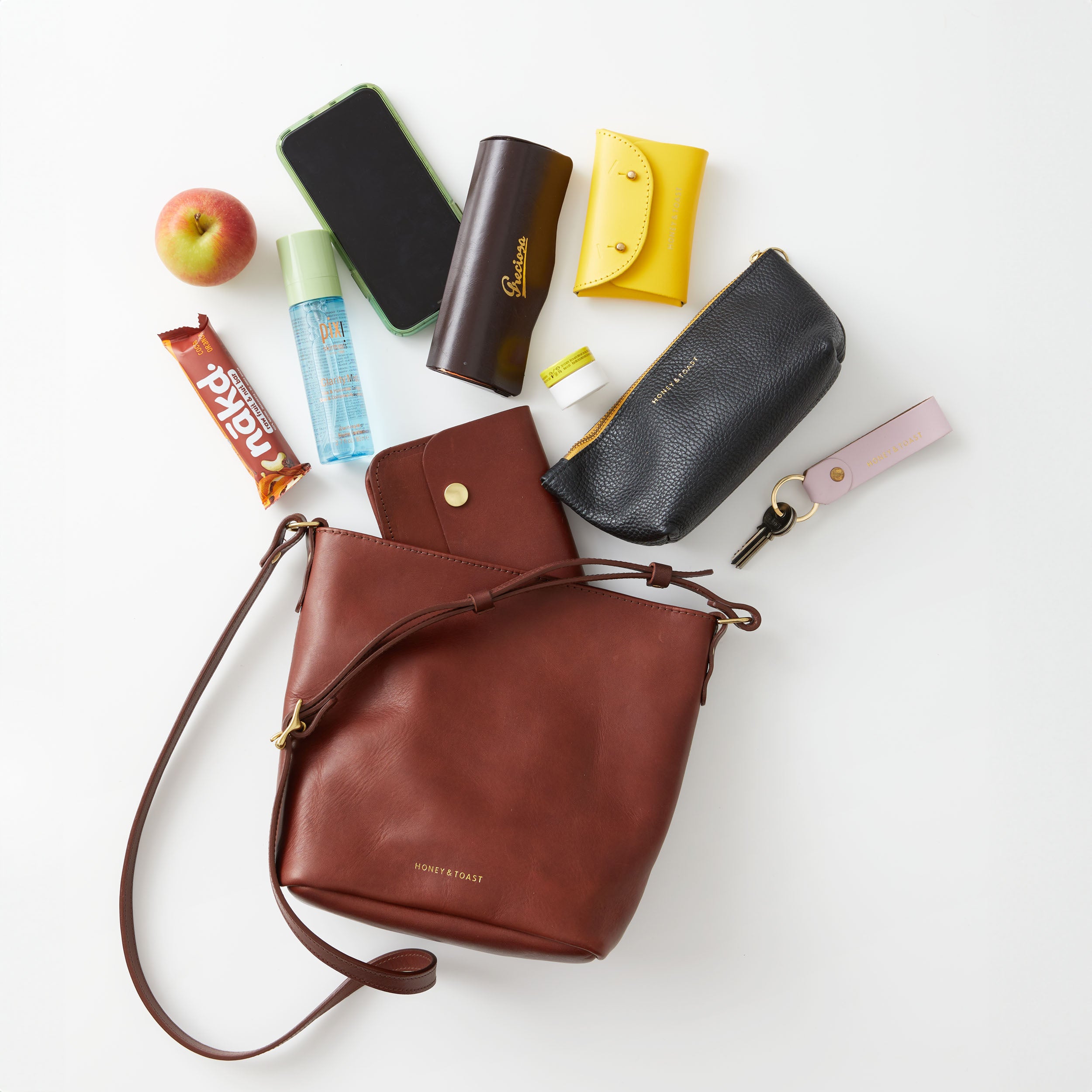 https://www.honeyandtoast.co.uk women's leather handbag Mini Libby conker