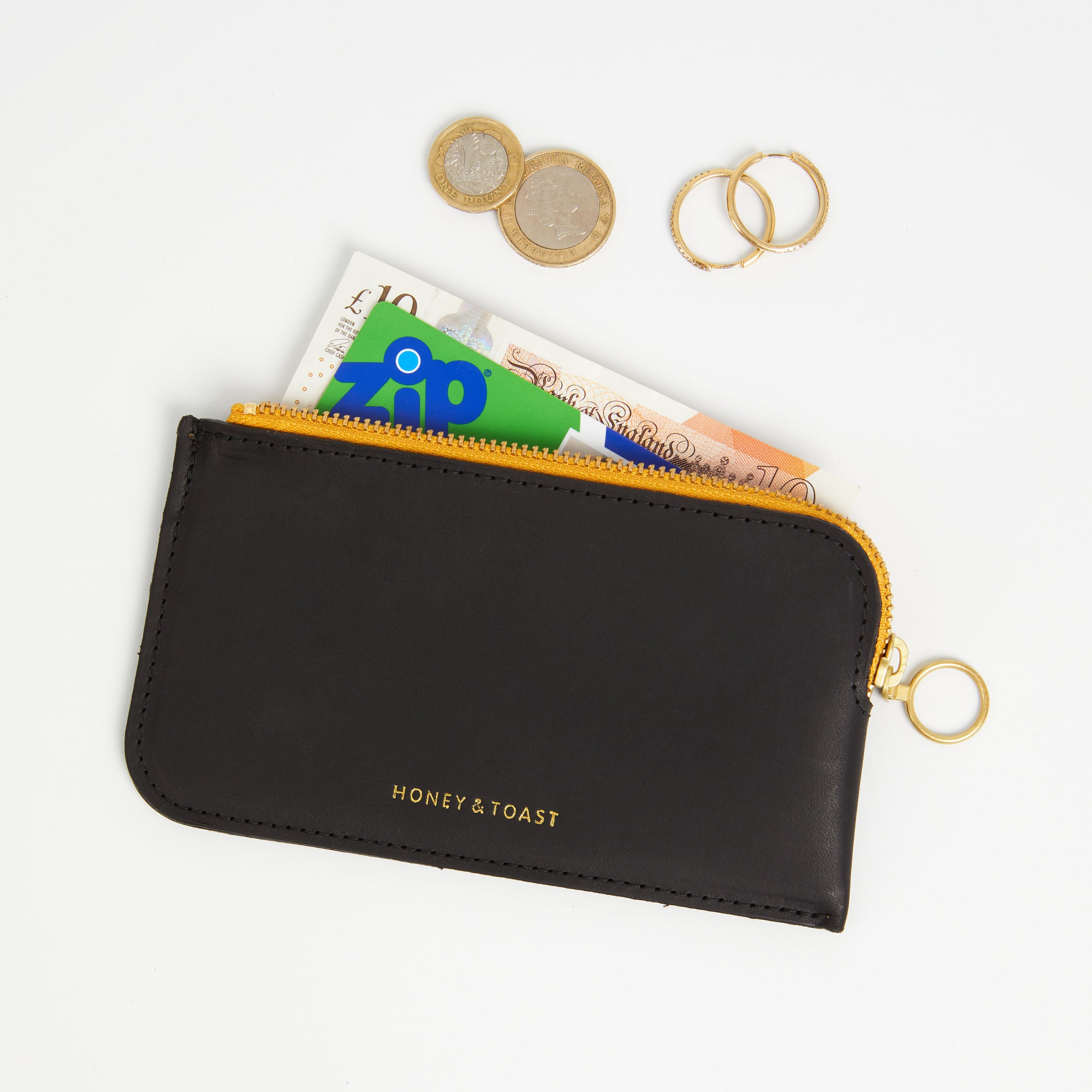 https://www.honeyandtoast.co.uk women's leather purse Bella zip around purse black