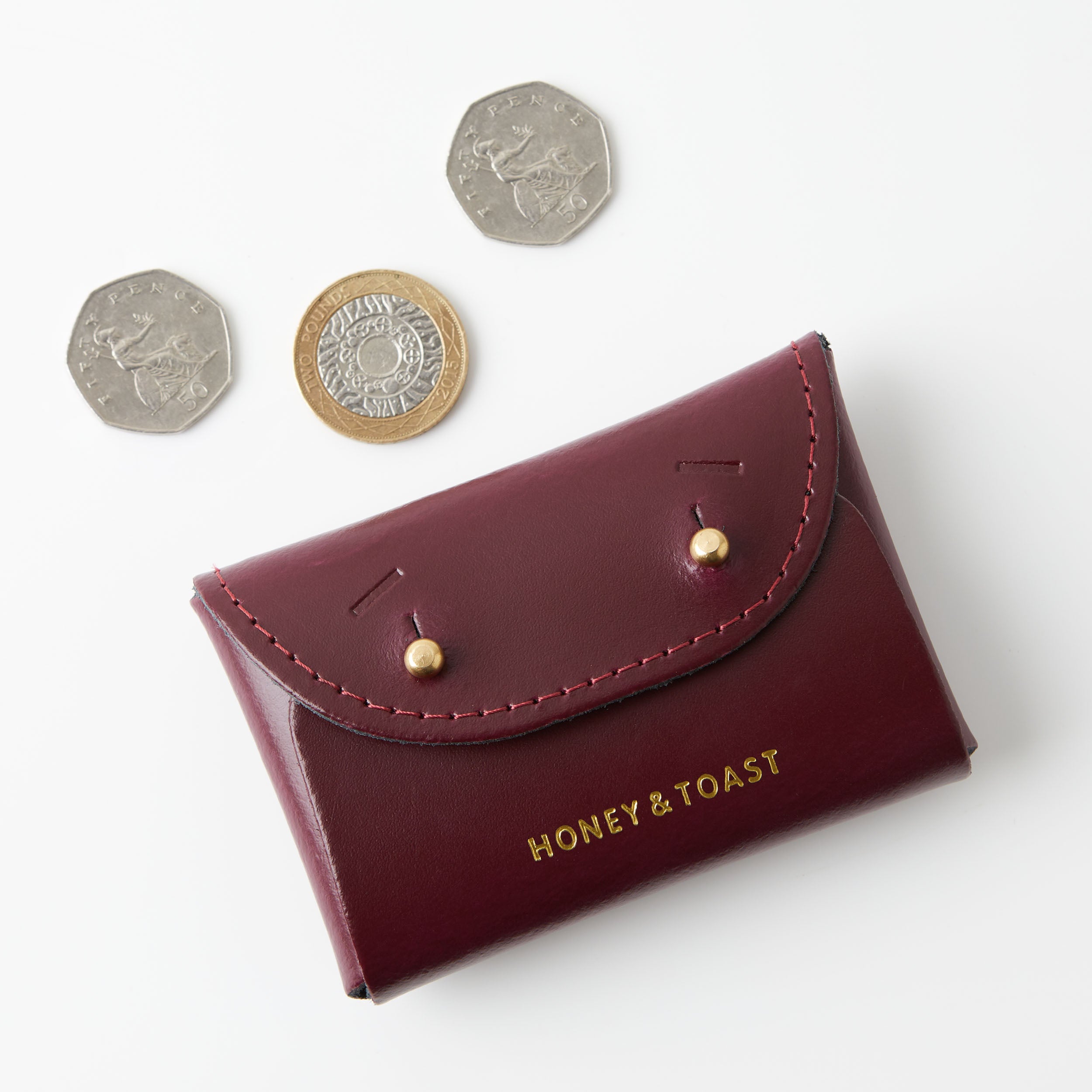 https://www.honeyandtoast.co.uk women's leather purse Jester card holder damson