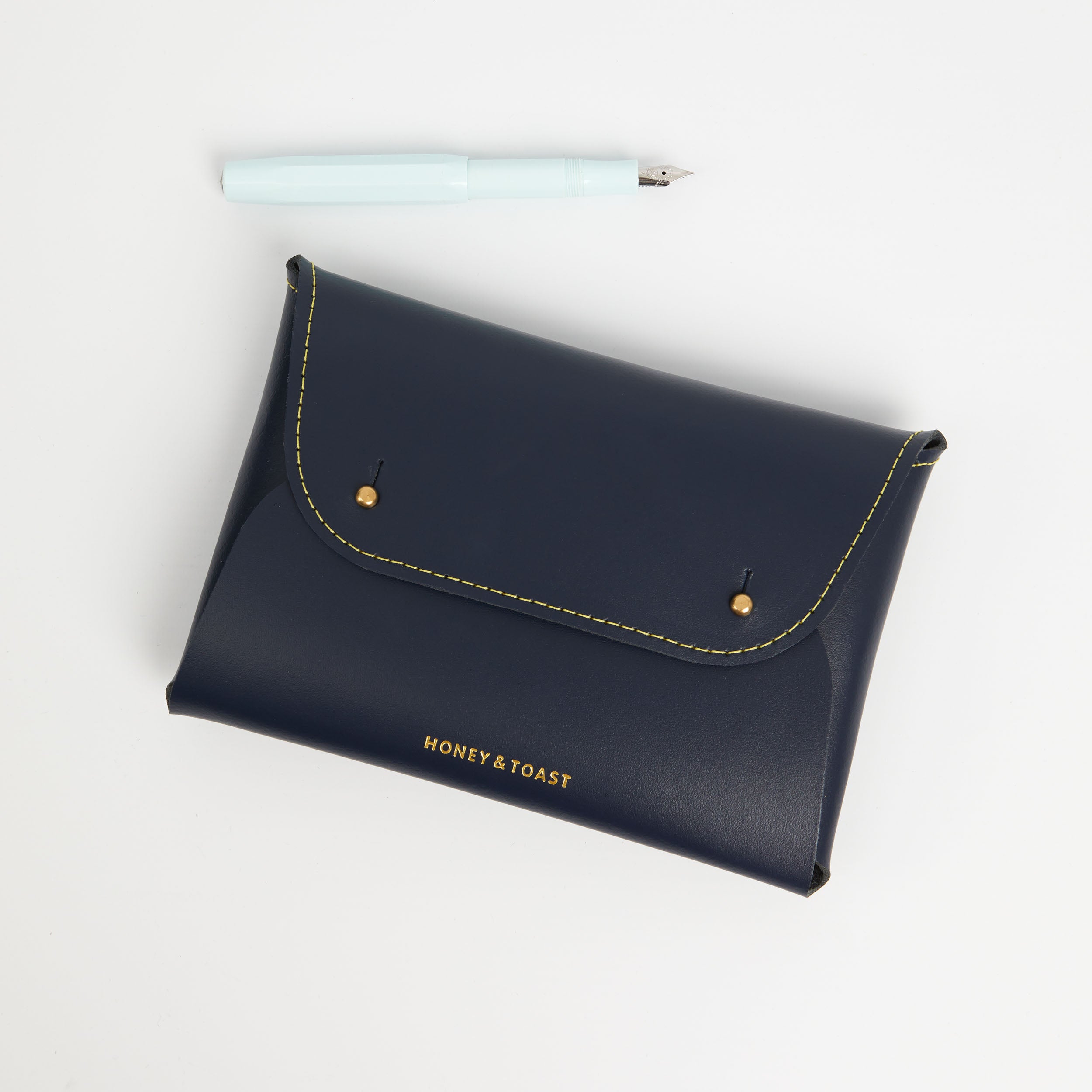https://www.honeyandtoast.co.uk women's leather purse Large Jester organiser navy