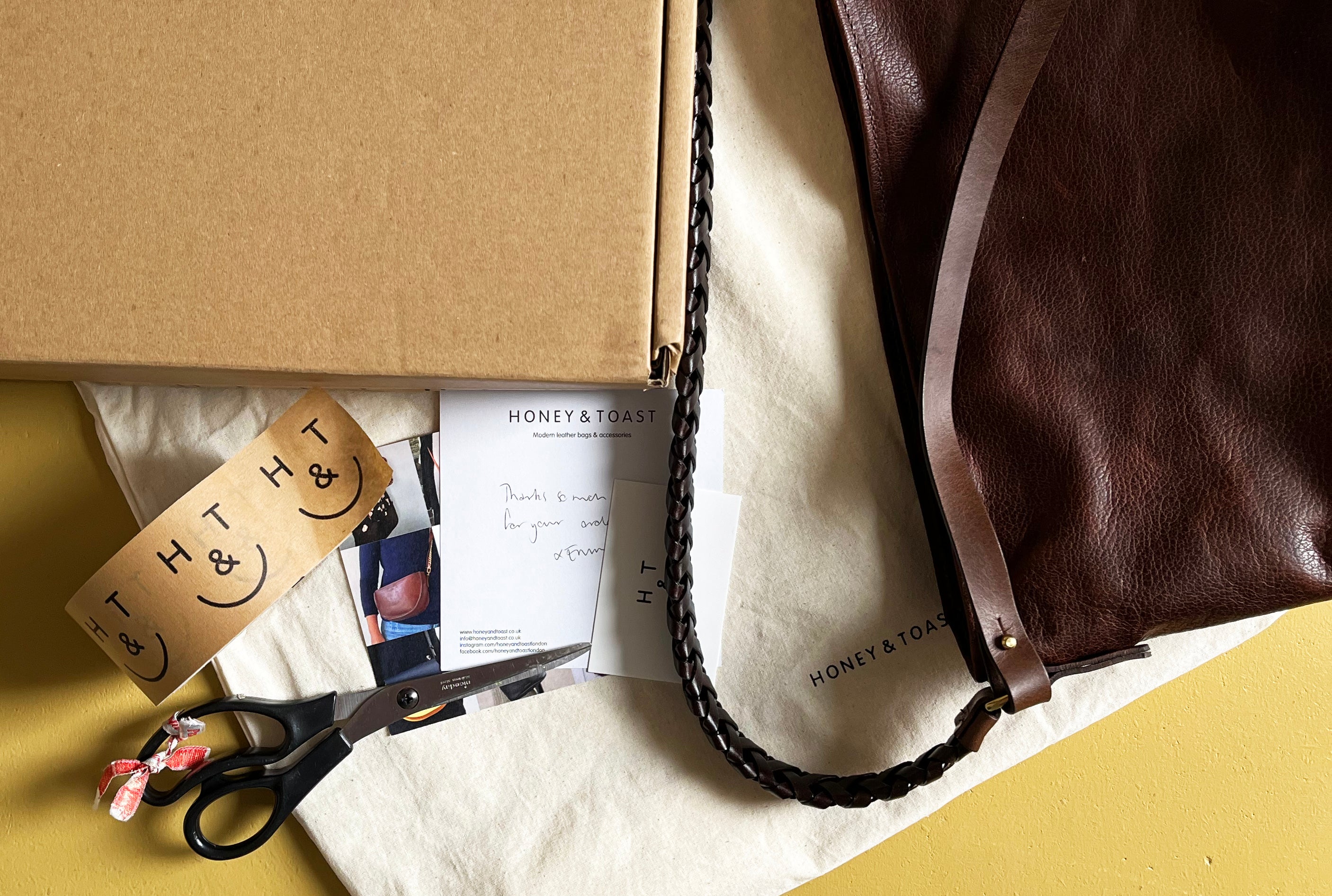 Honey and Toast leather bag being packed ready to ship