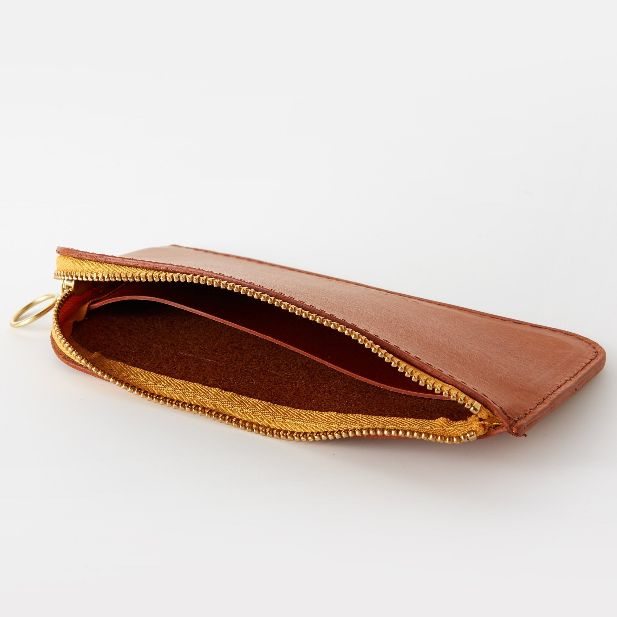 https://www.honeyandtoast.co.uk Bella zip around purse tan