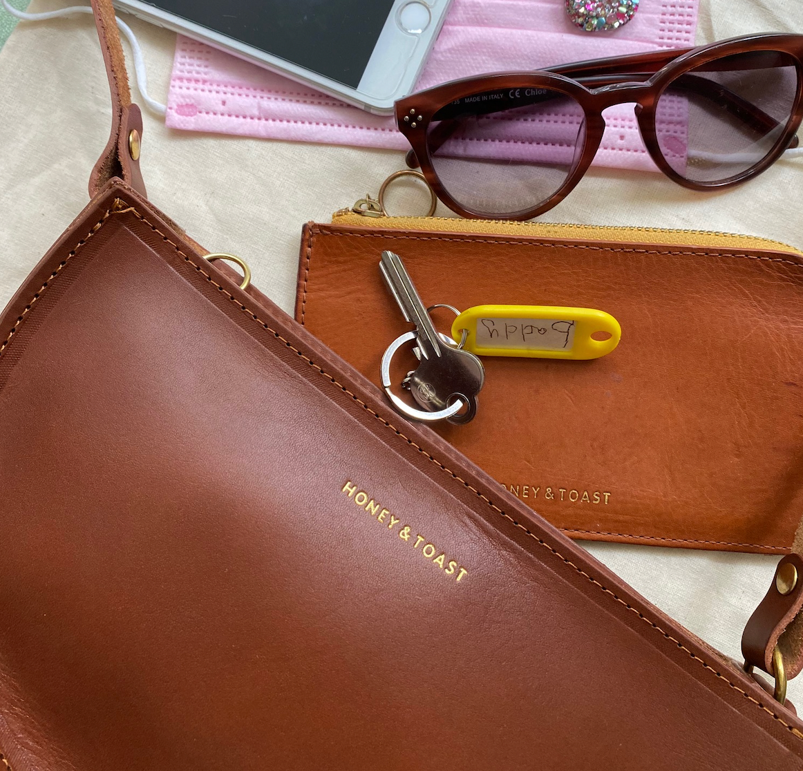 https://www.honeyandtoast.co.uk Bella zip around purse tan