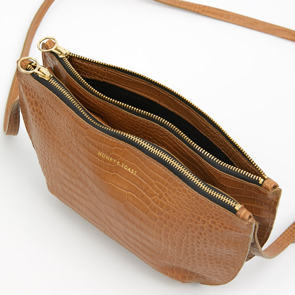 https://www.honeyandtoast.co.uk Double Half moon bag tan