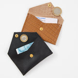 https://www.honeyandtoast.co.uk Envelope purse tan crocodile embossed leather