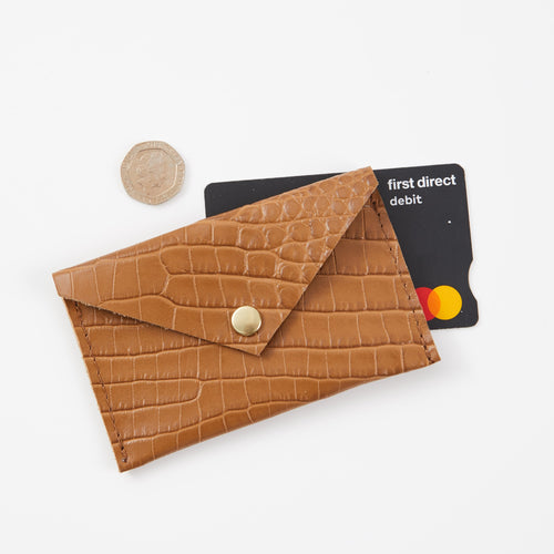 https://www.honeyandtoast.co.uk Envelope purse tan crocodile embossed leather