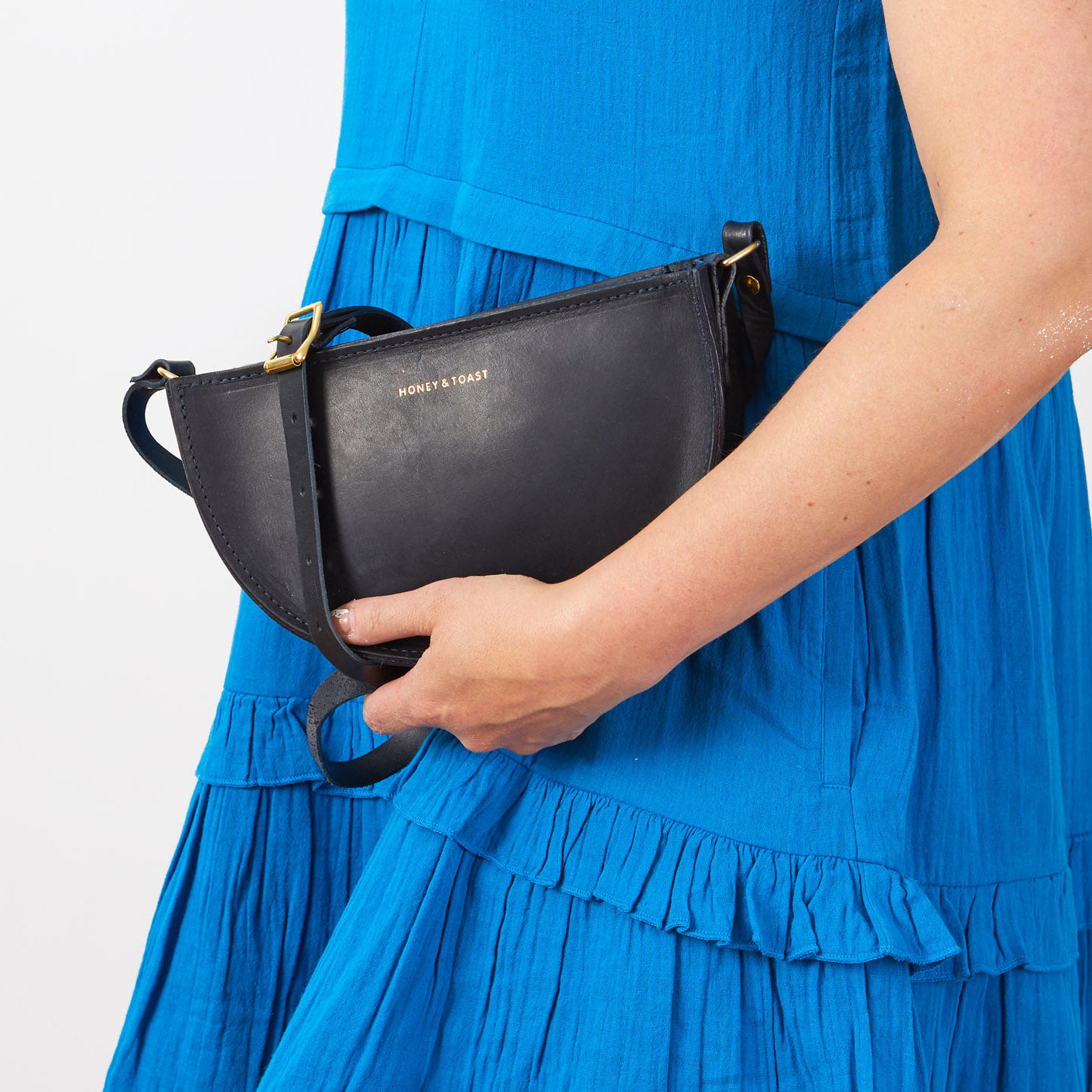 https://www.honeyandtoast.co.uk Half moon bag black