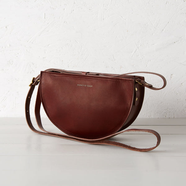 https://www.honeyandtoast.co.uk Half moon bag conker SAMPLE SALE