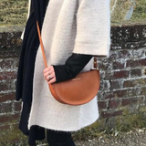 https://www.honeyandtoast.co.uk Half moon bag tan SAMPLE SALE