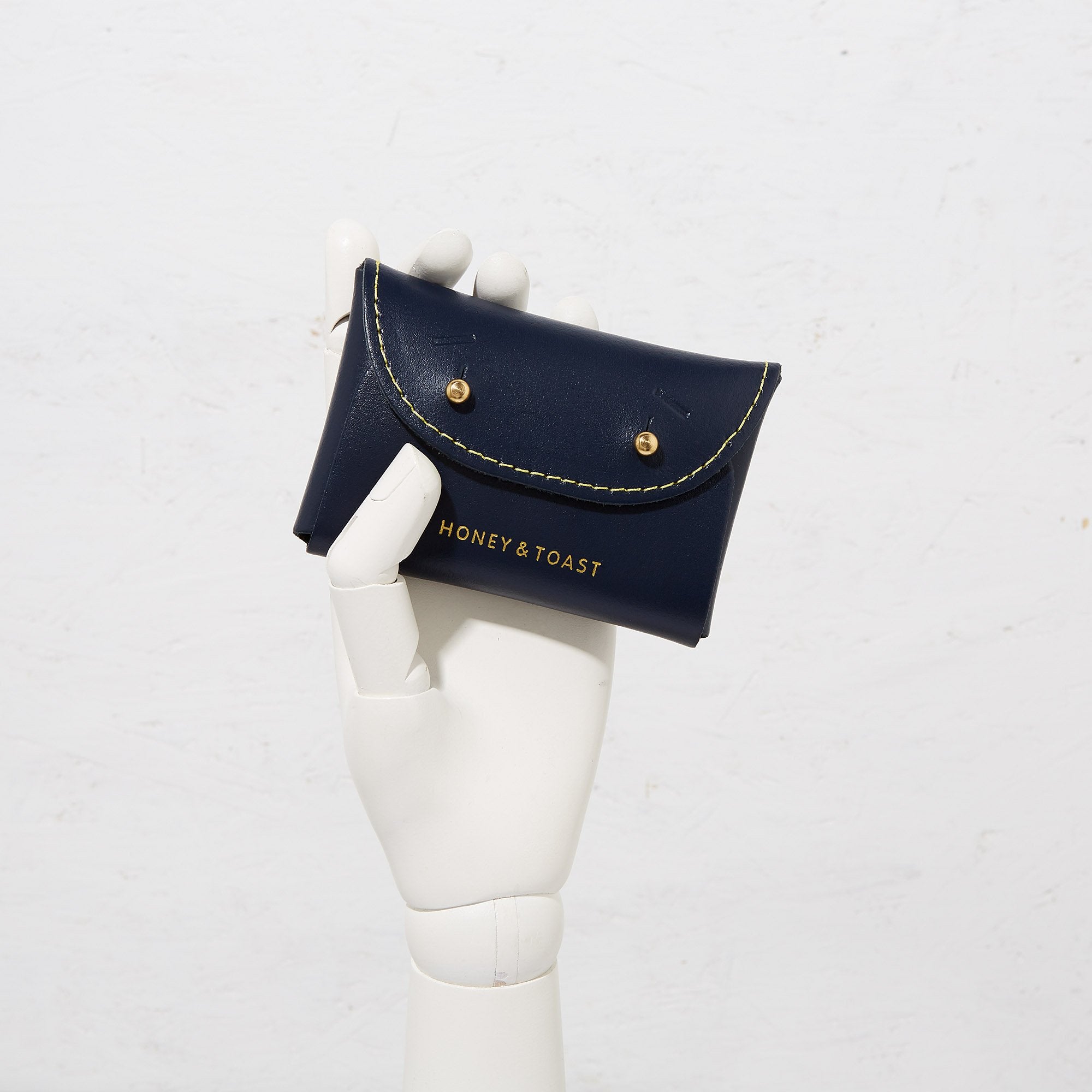 https://www.honeyandtoast.co.uk Jester card holder navy