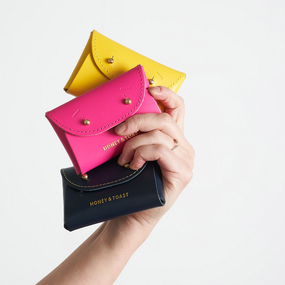 https://www.honeyandtoast.co.uk Jester card holder sun yellow