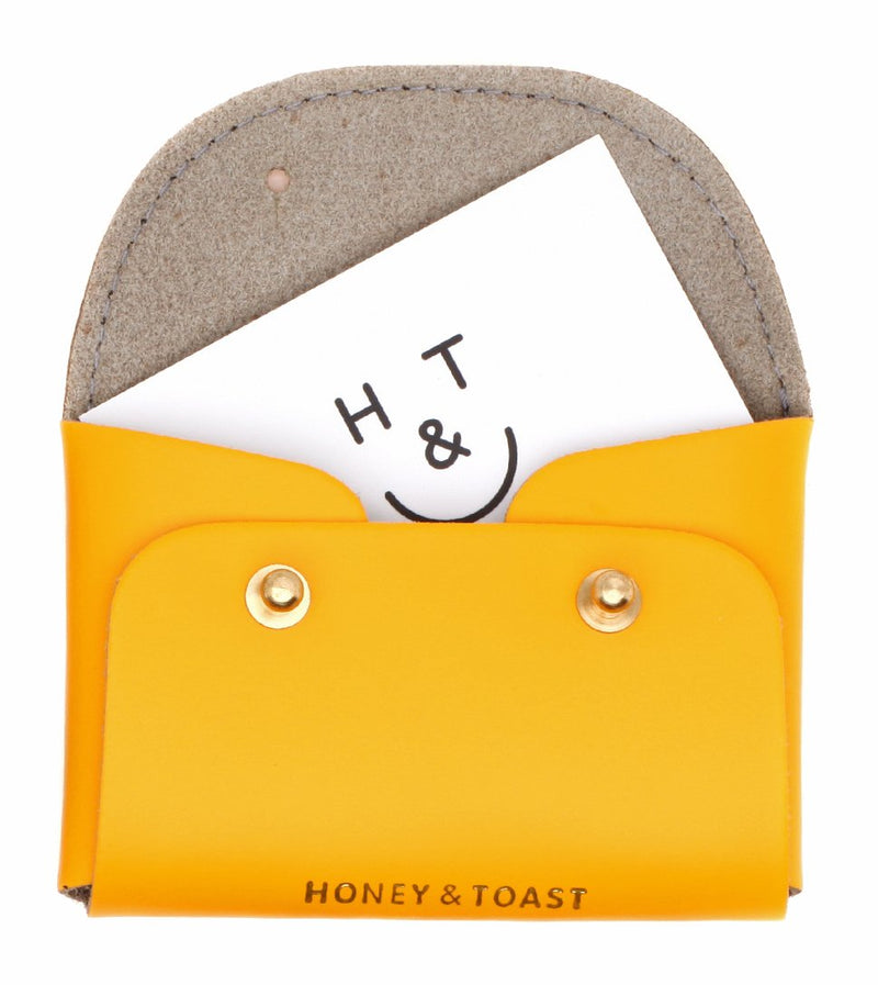 https://www.honeyandtoast.co.uk Jester card holder sun yellow