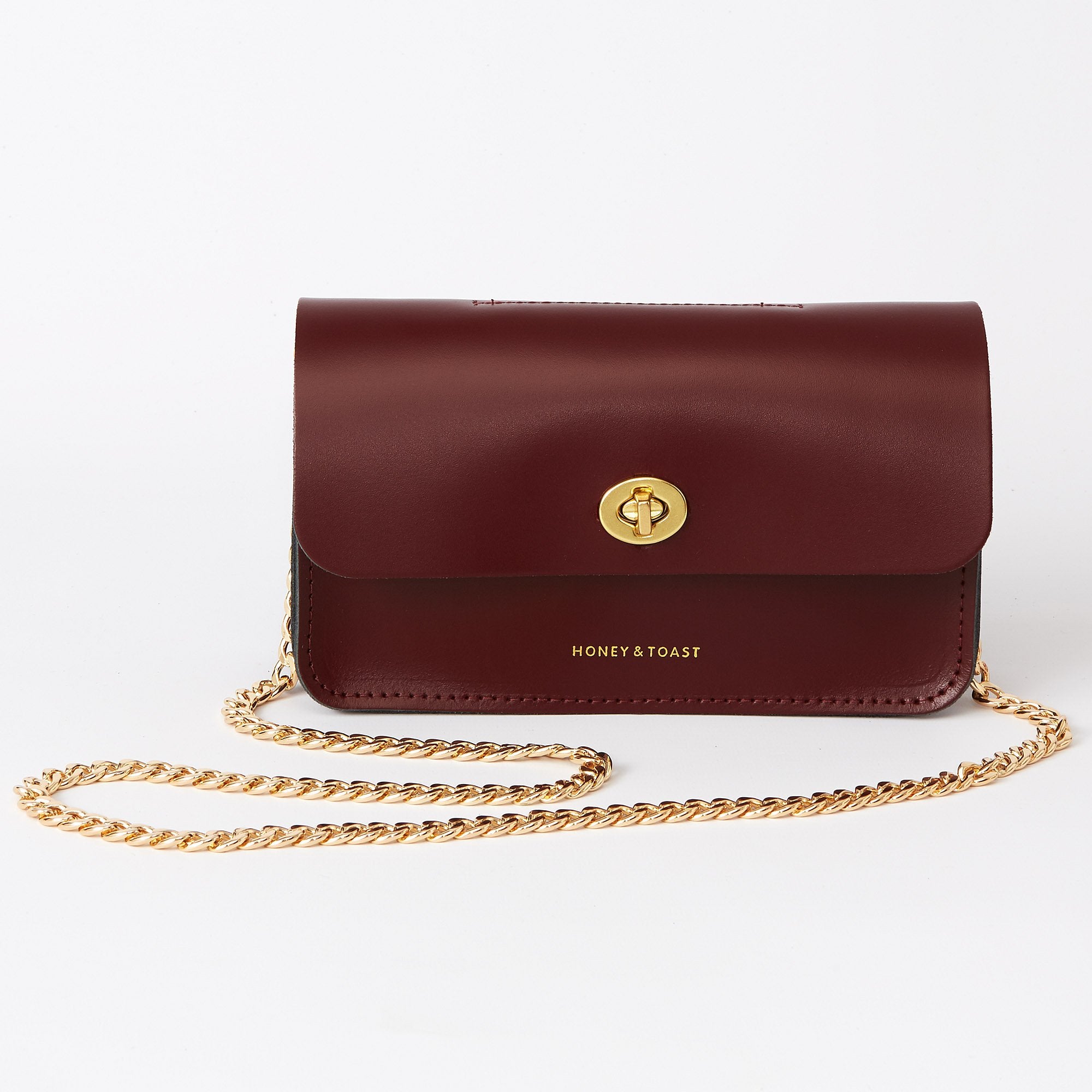 https://www.honeyandtoast.co.uk Mini Eddie shoulder bag damson