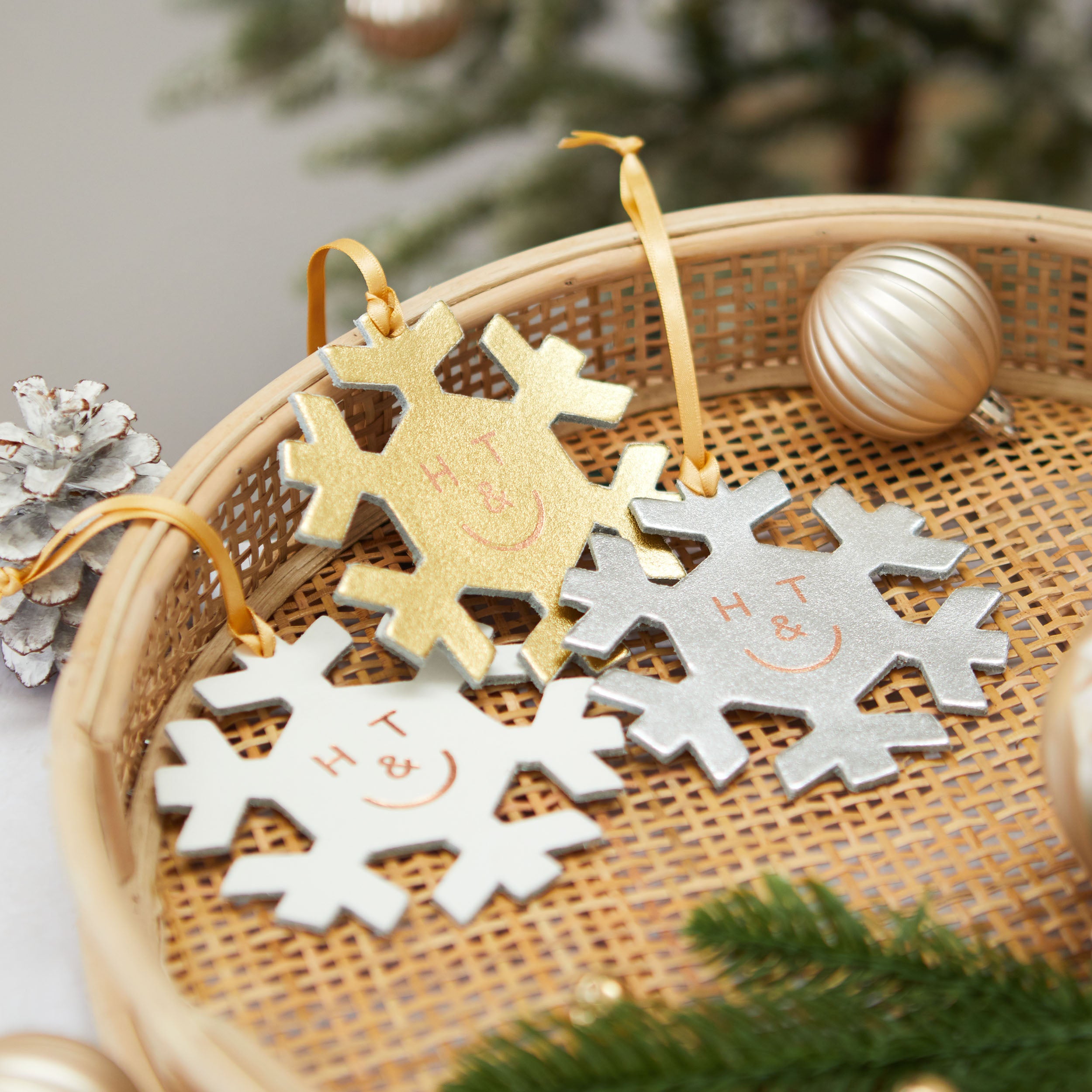 https://www.honeyandtoast.co.uk Snowflake hanging decoration silver