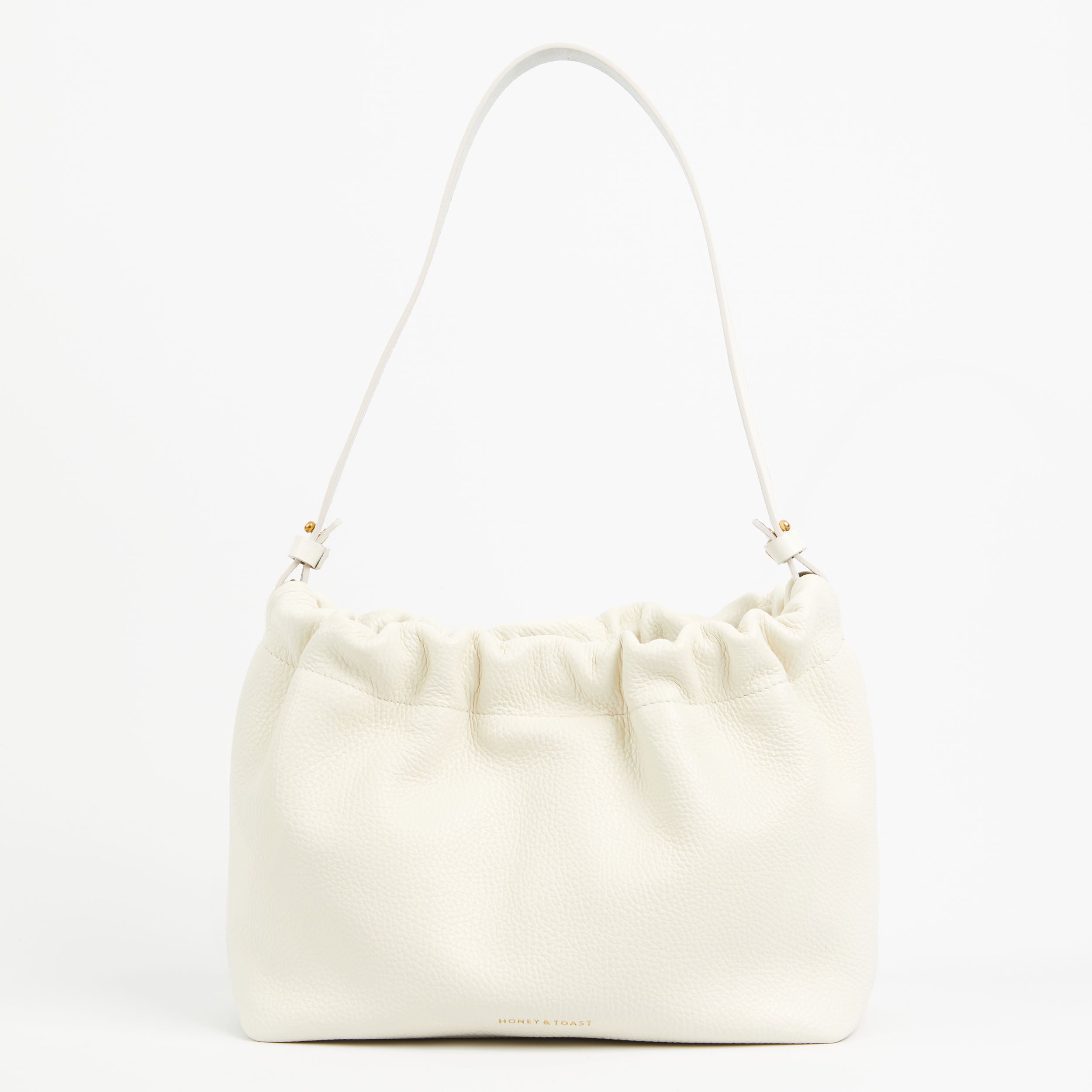 https://www.honeyandtoast.co.uk women's leather handbag Jamie cinch shoulder bag chalk white
