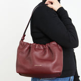 https://www.honeyandtoast.co.uk women's leather handbag Jamie cinch shoulder bag damson